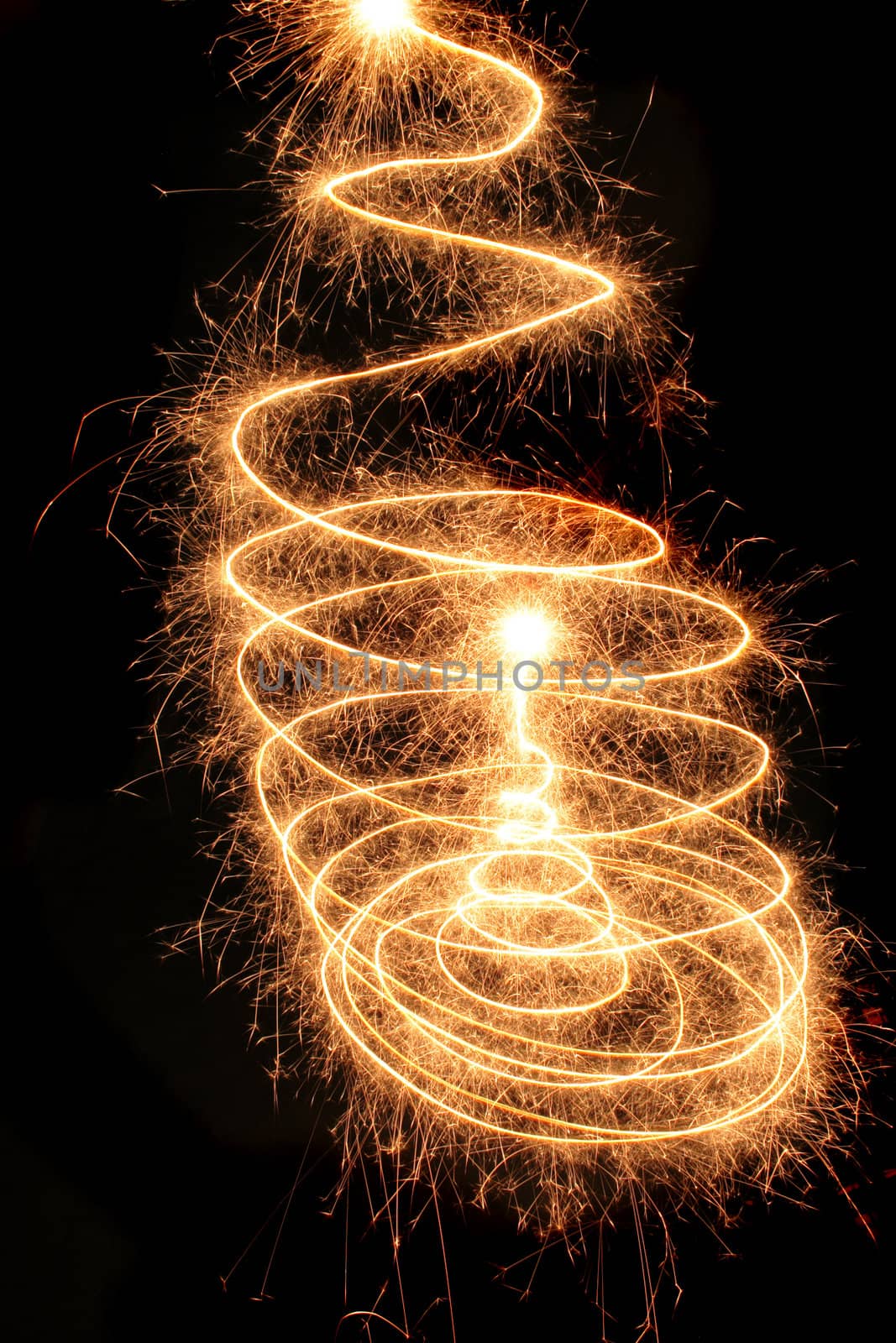 christmas tree from the sparklers in the dark night