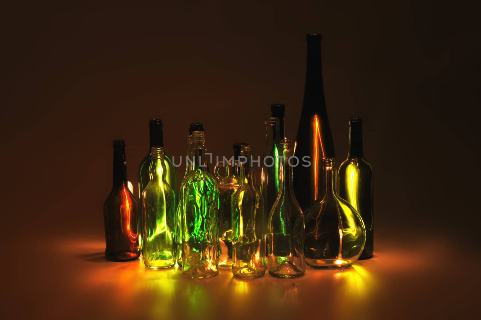 empty bottles in the night as interesting color background