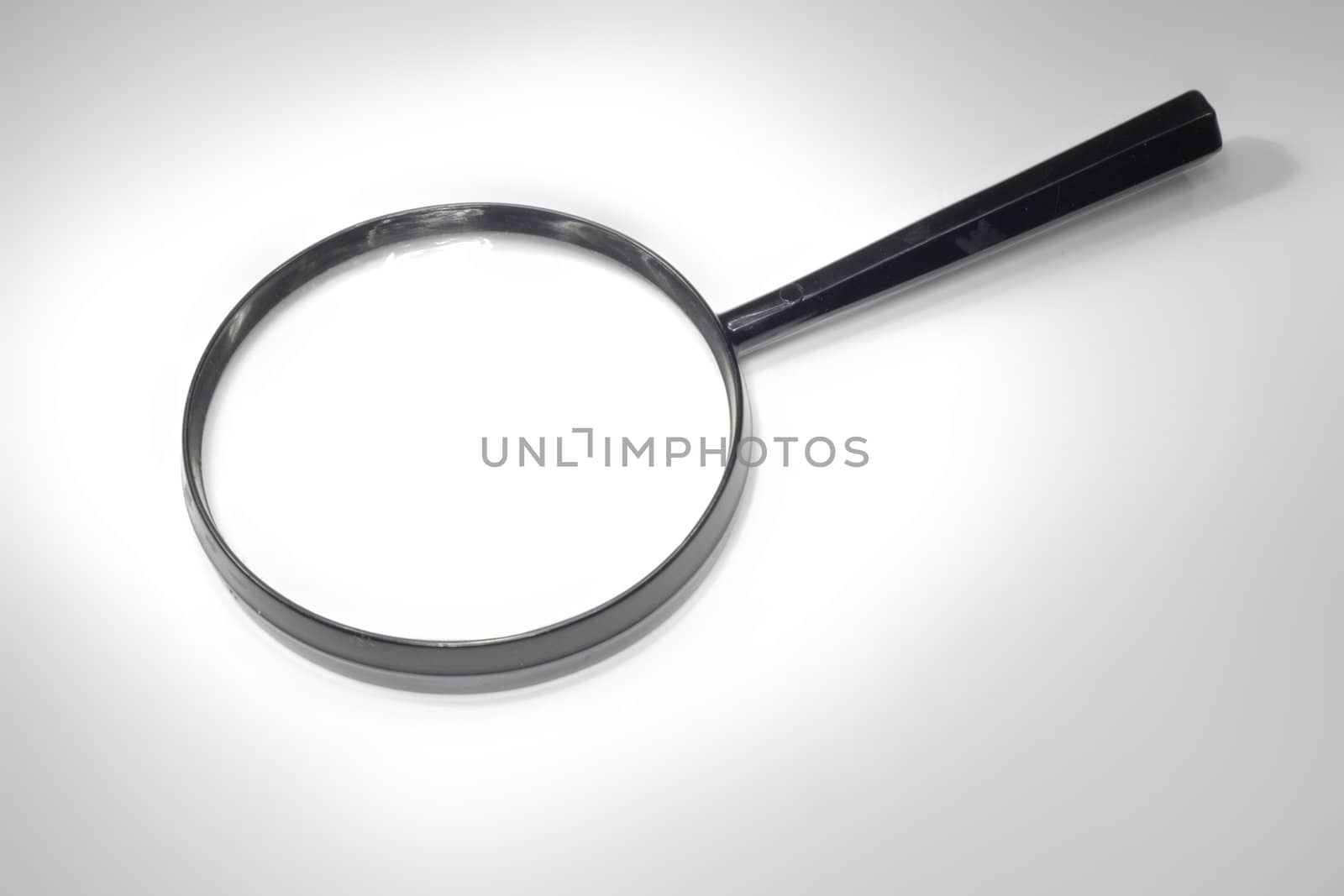 magnify glass isolated on the white paper 