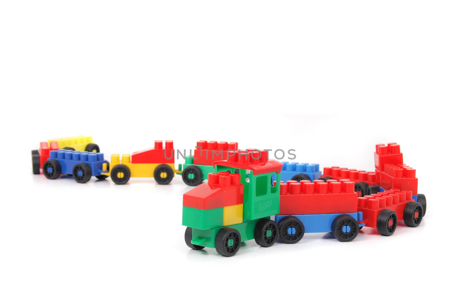 color plastic train toy isolated on the white background