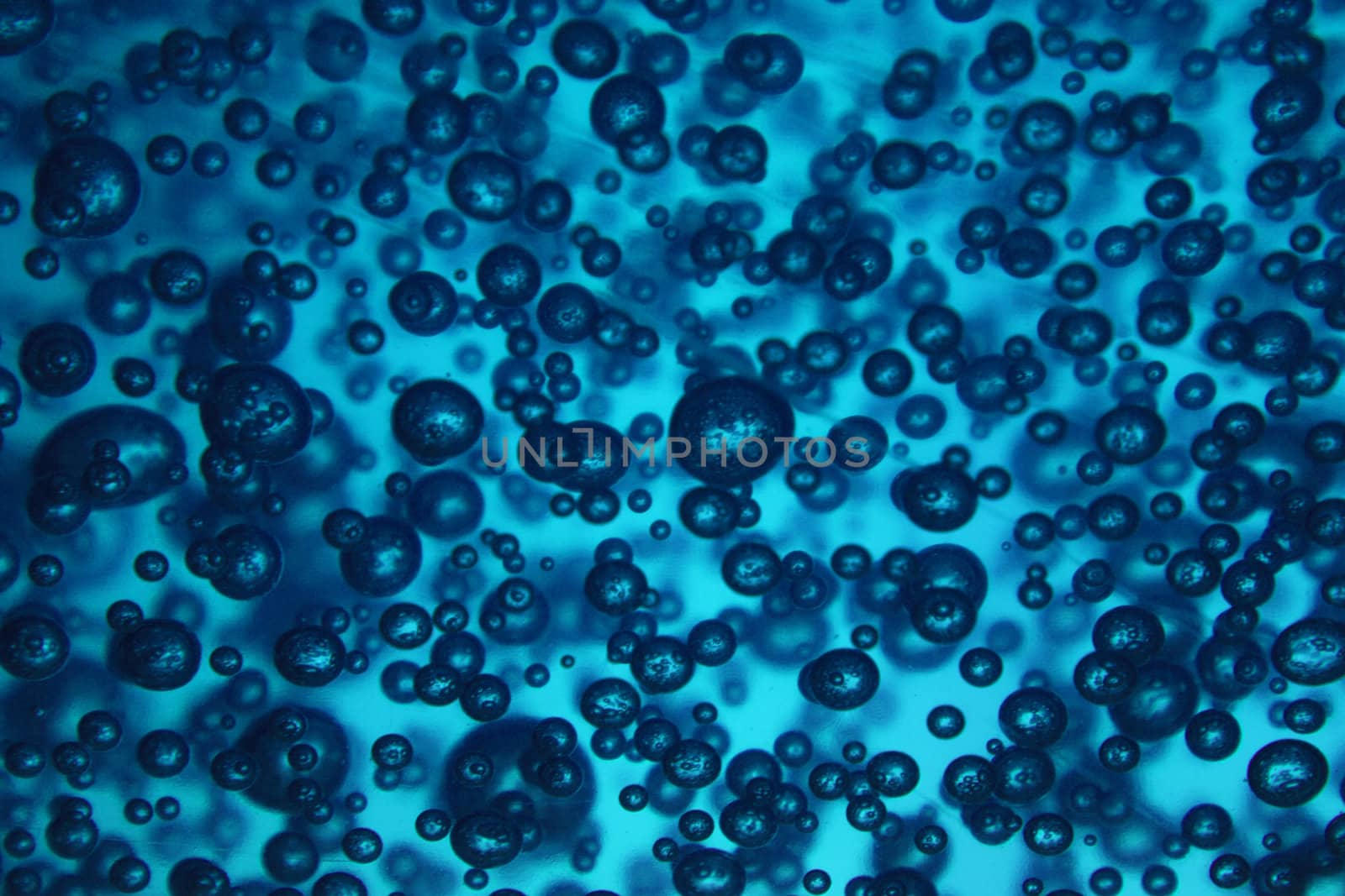 natural blue water background with oxygen bubbles