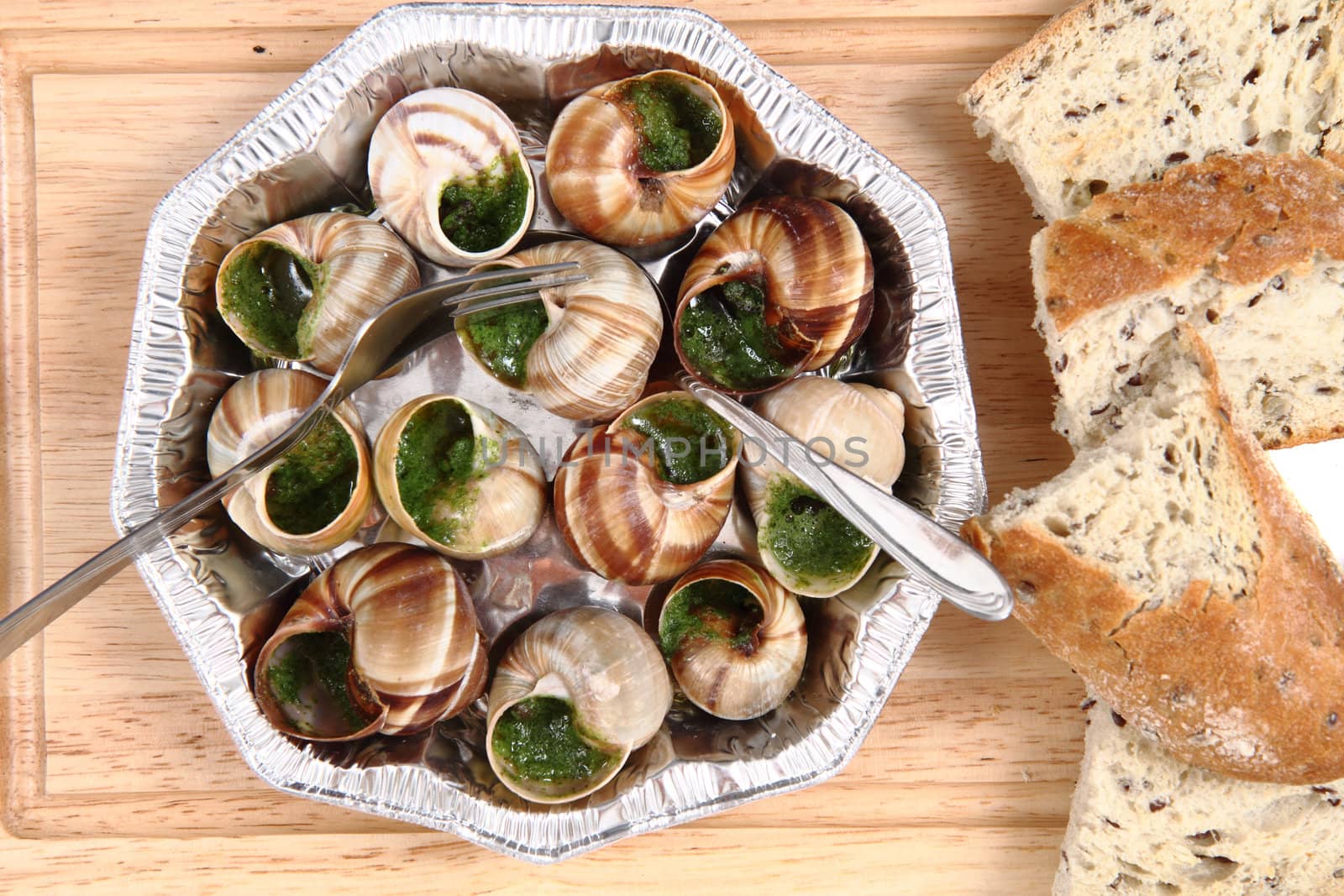 snails as french gourmet food with white bread
