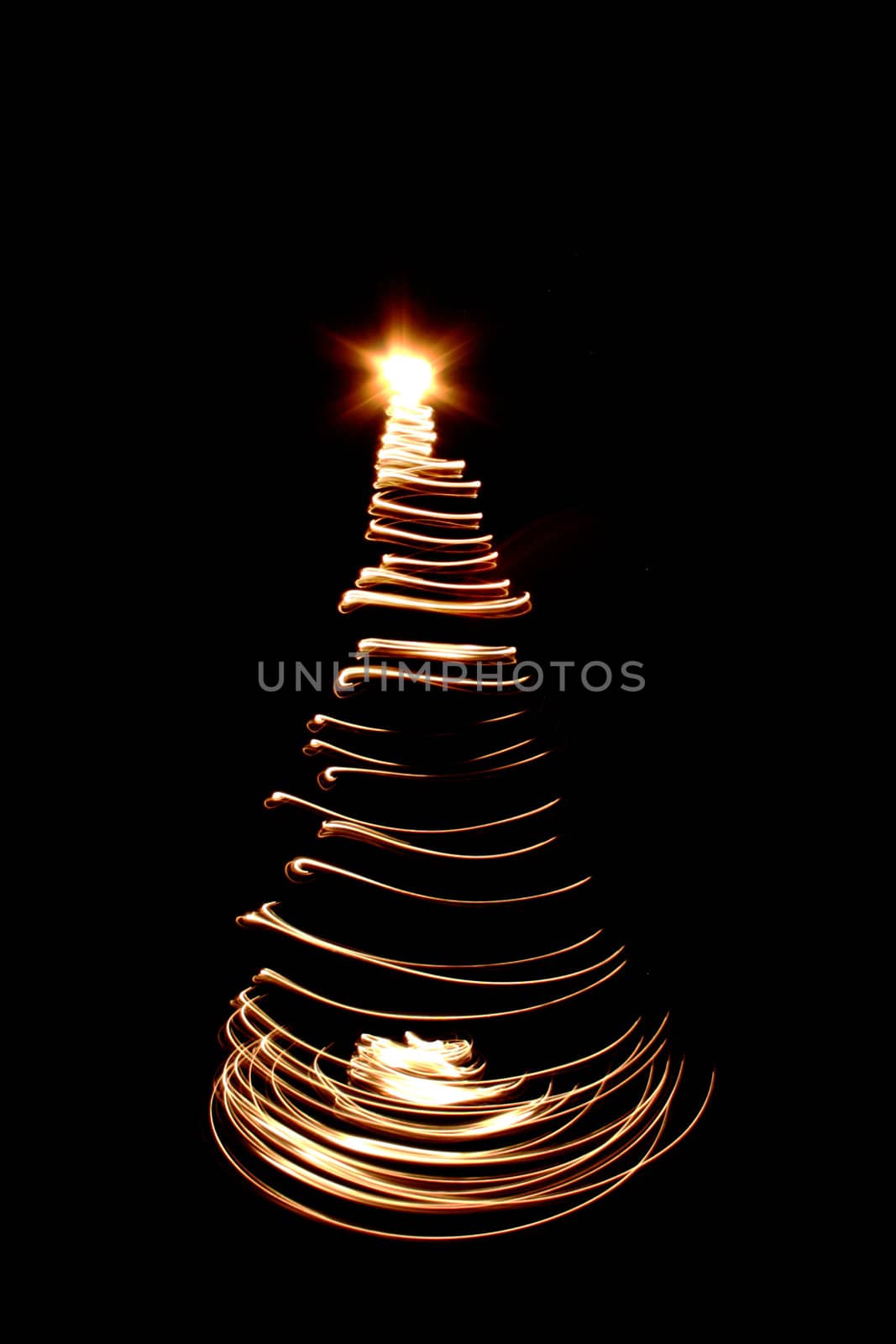 christmas tree frrom the bulb light on the black background