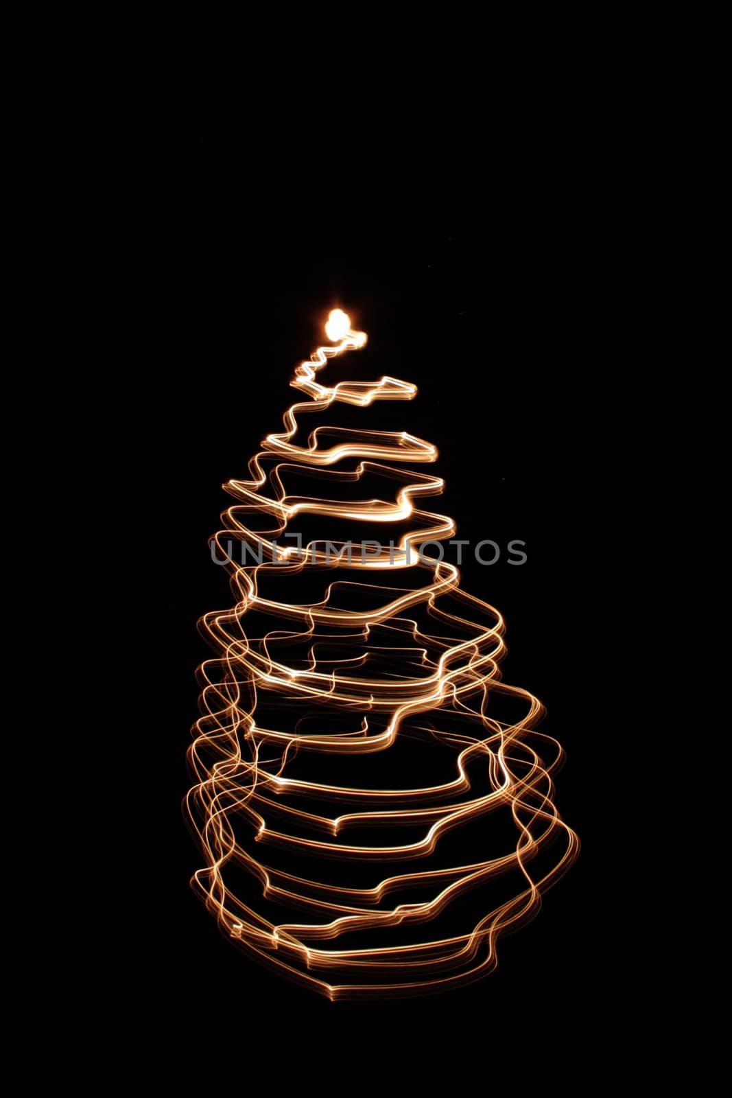 christmas tree frrom the bulb light on the black background