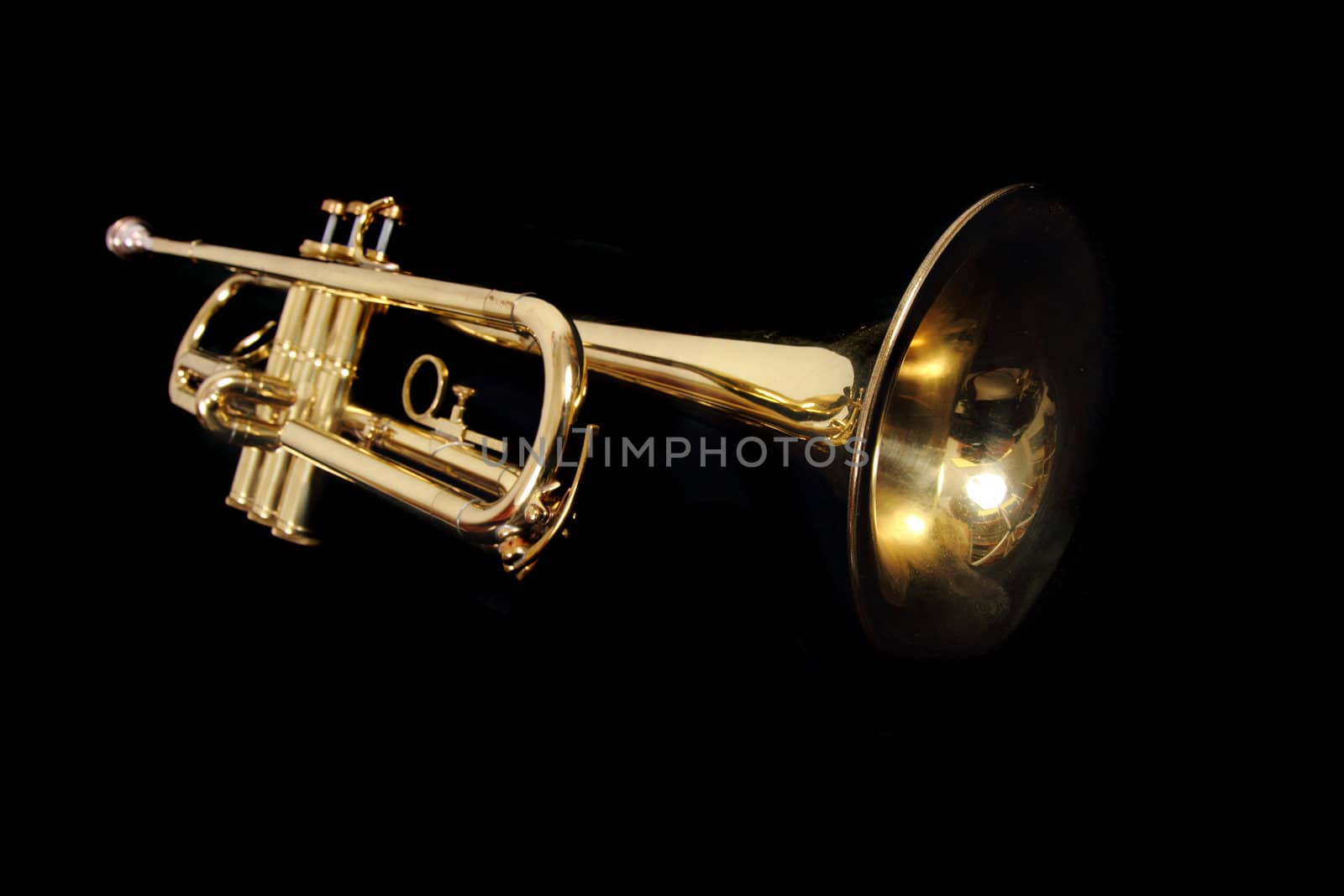 gold trumpet isolated on the black background
