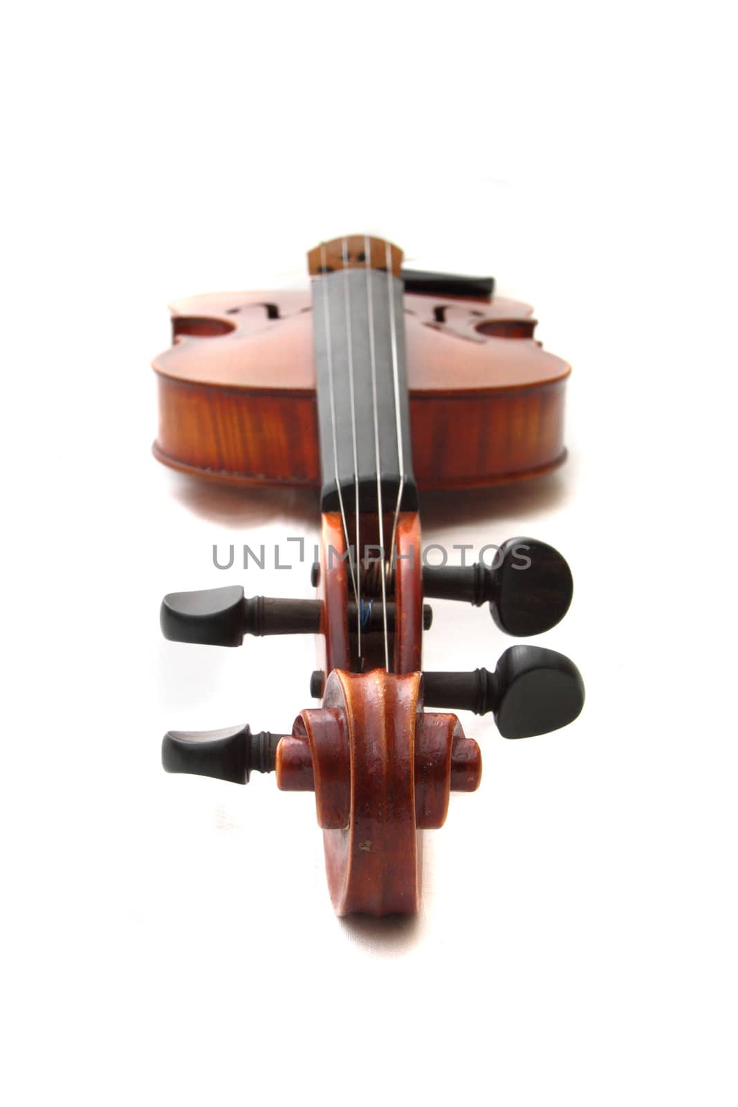 old wooden violin isolated on the white background