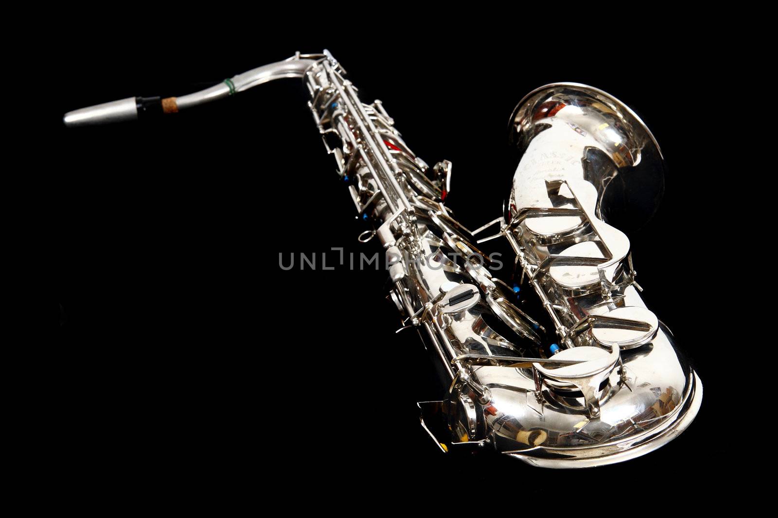silver saxophone isolated on the black background