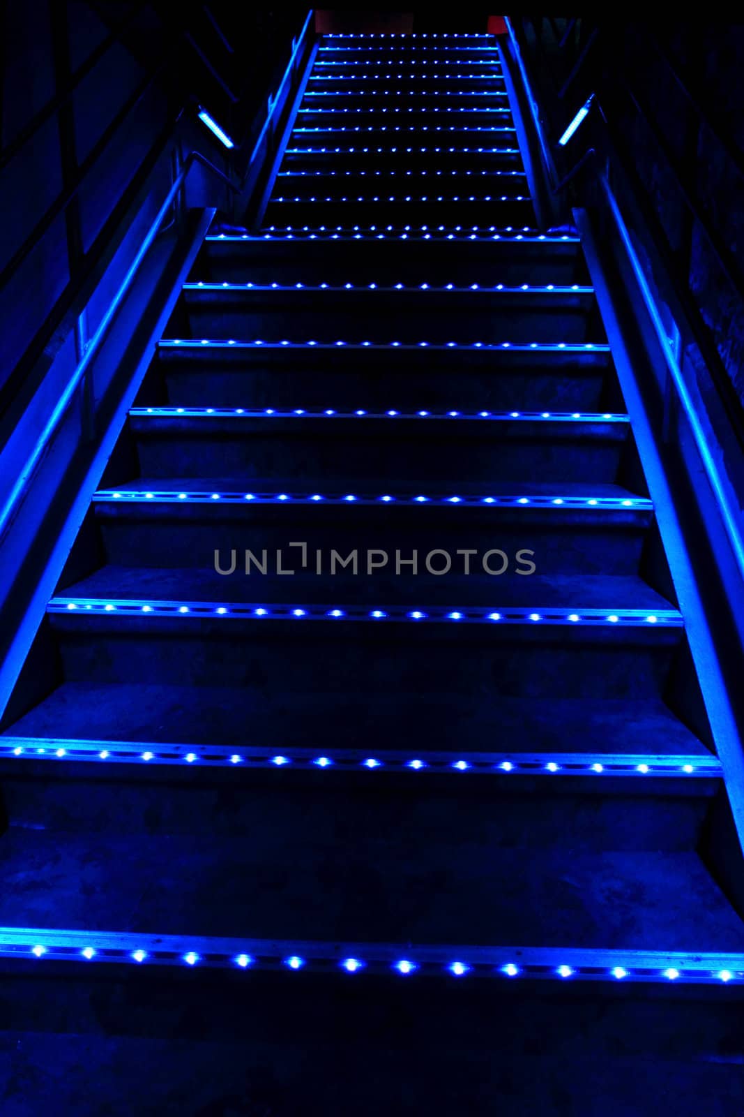 blue stairway in the very dark night 