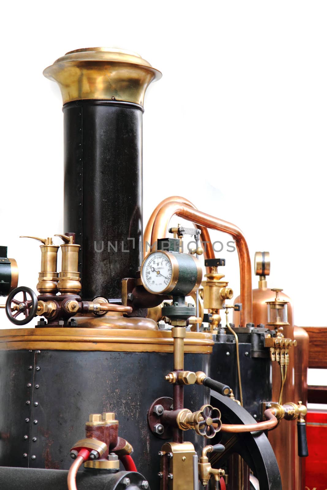 detail of old steam machine isolated on the white background