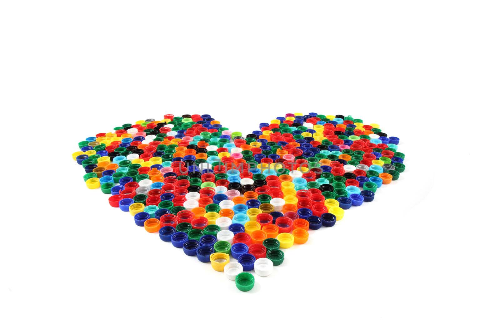 heart from color caps isolated on the white background