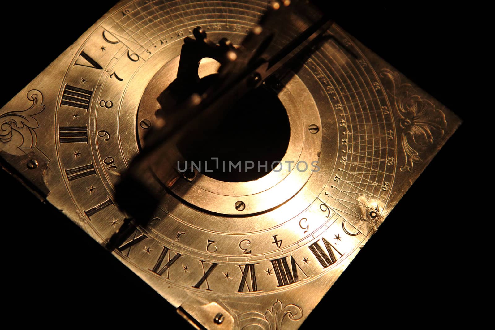 very old golden sundial beneath by jonnysek