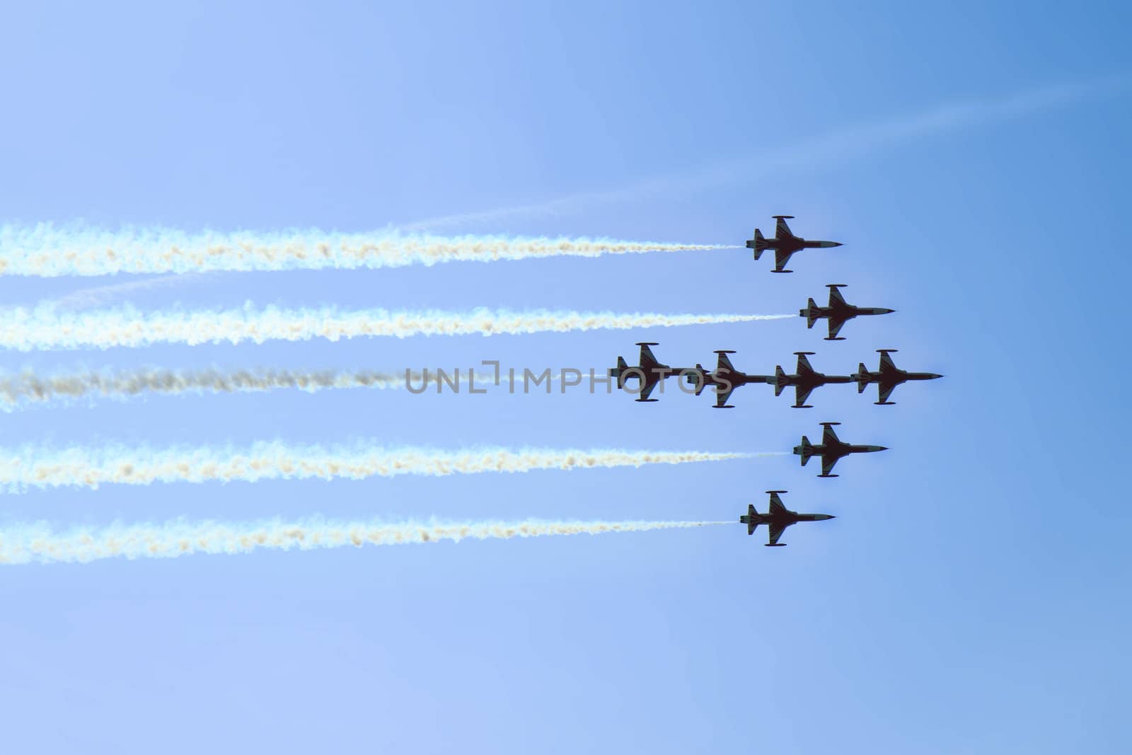 aircrafts on the blue sky in the air show as nice background