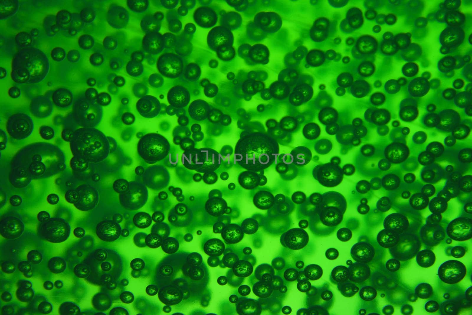 natural green water background with oxygen bubbles