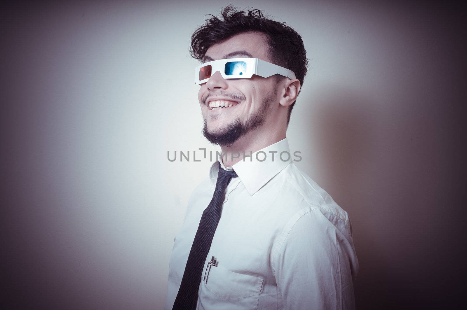 businessman with 3d eyewear on gray background