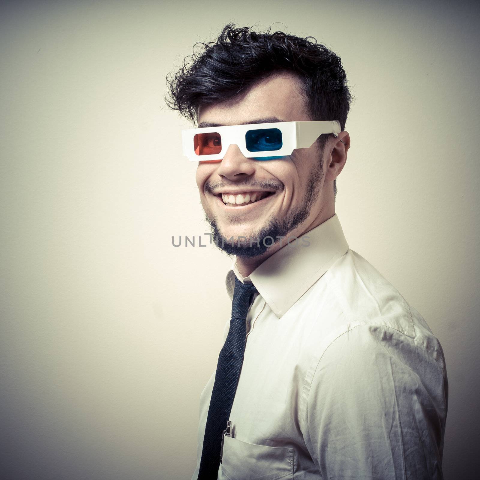 businessman with 3d eyewear on gray background