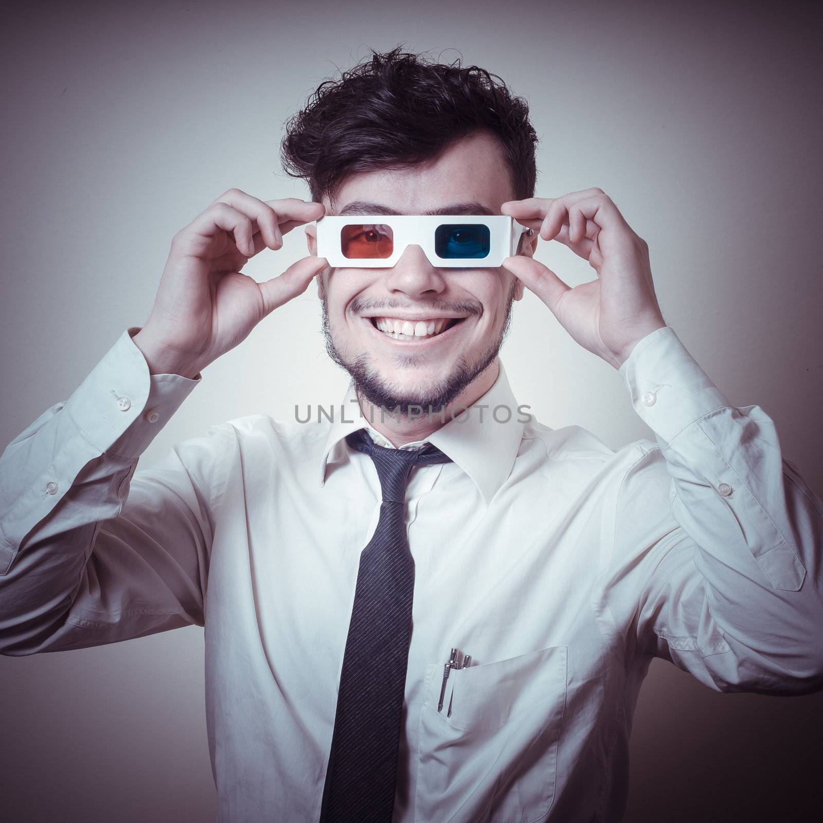 businessman with 3d eyewear on gray background