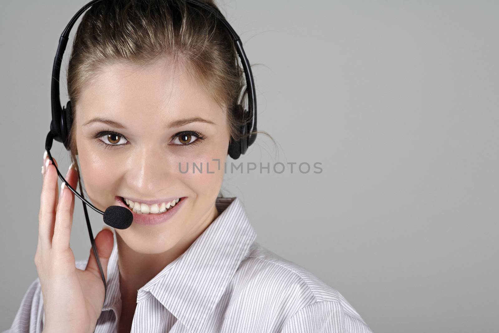 Woman in call centre by studiofi