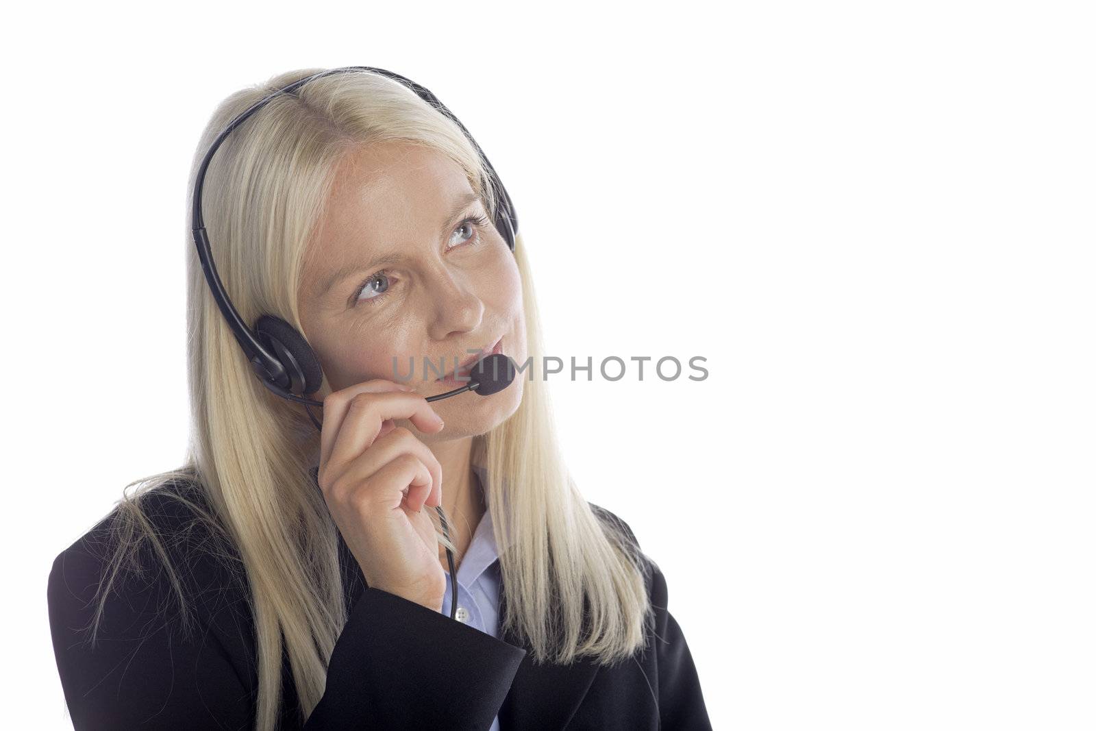 Young woman in smart clothes using a call centre head set