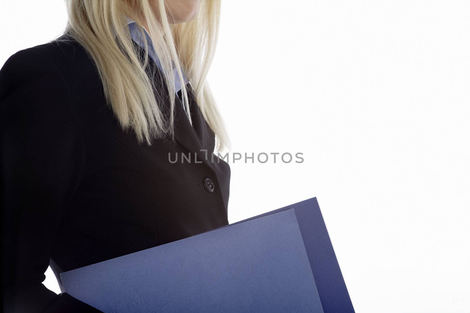 Young professional holding folders by studiofi