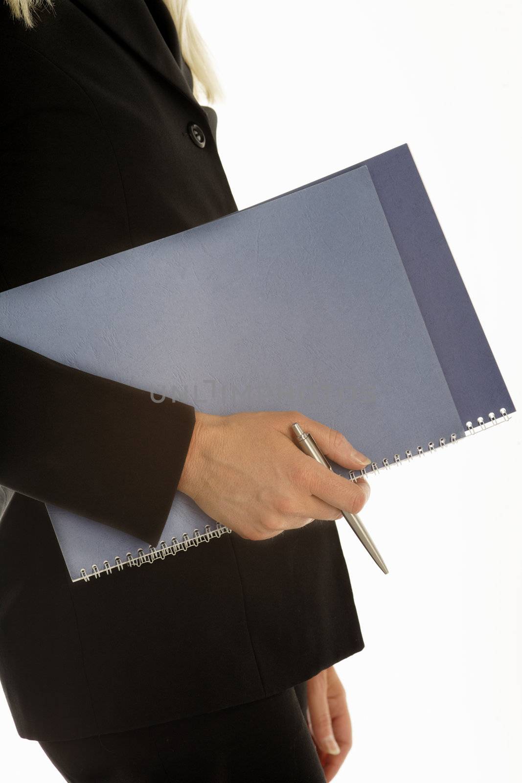 Young business professional holding blue folders on an isolated background