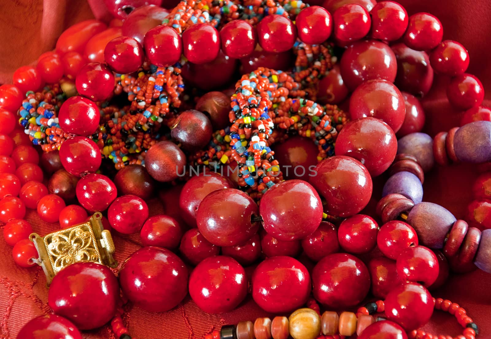  bloody red beads necklace on a purple background