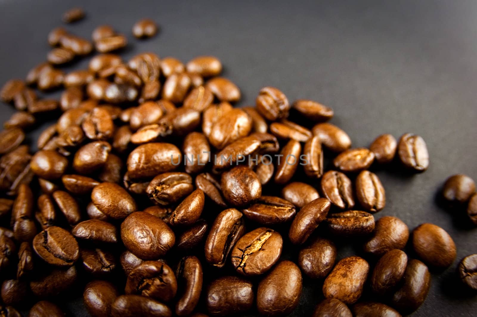 Coffee beans background.
Selective focus. 