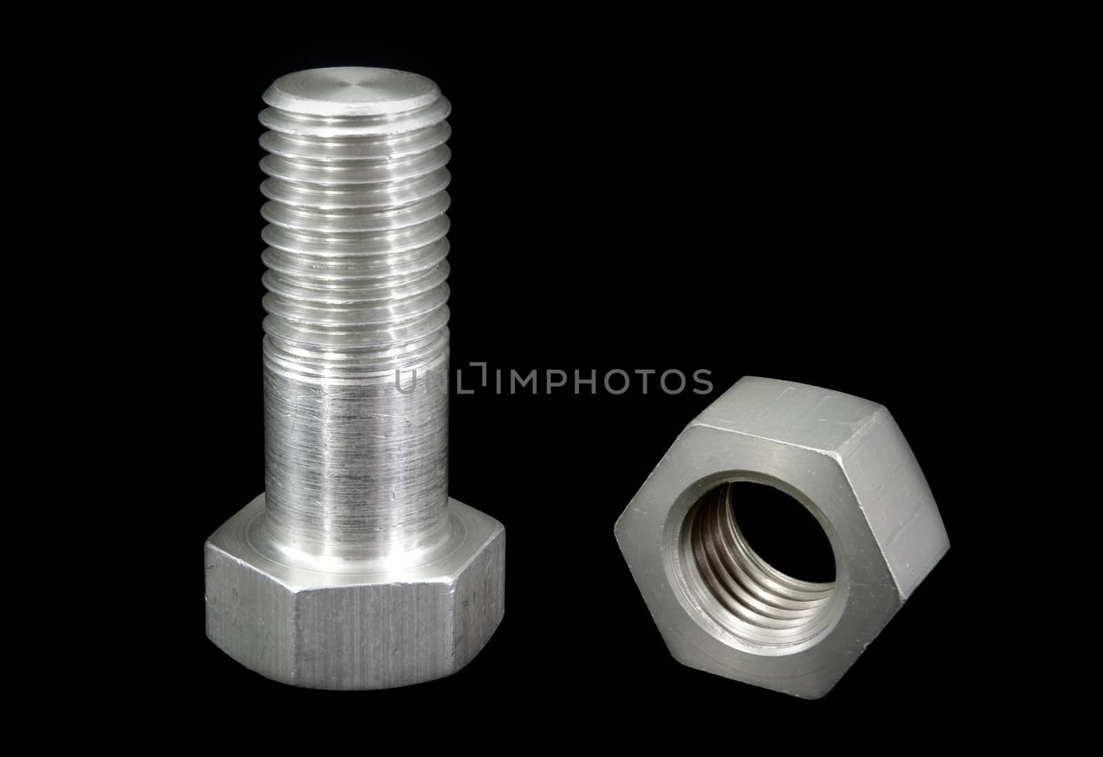 aluminum bolt and nut isolated on black background