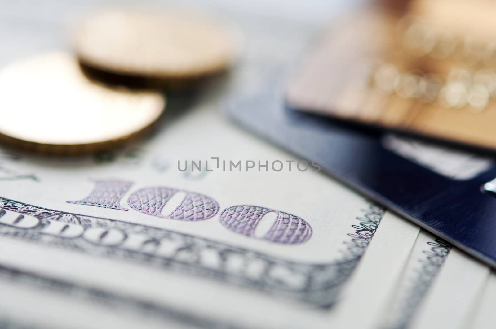 USD banknote, coins and credit card. selective focus. closeup.
