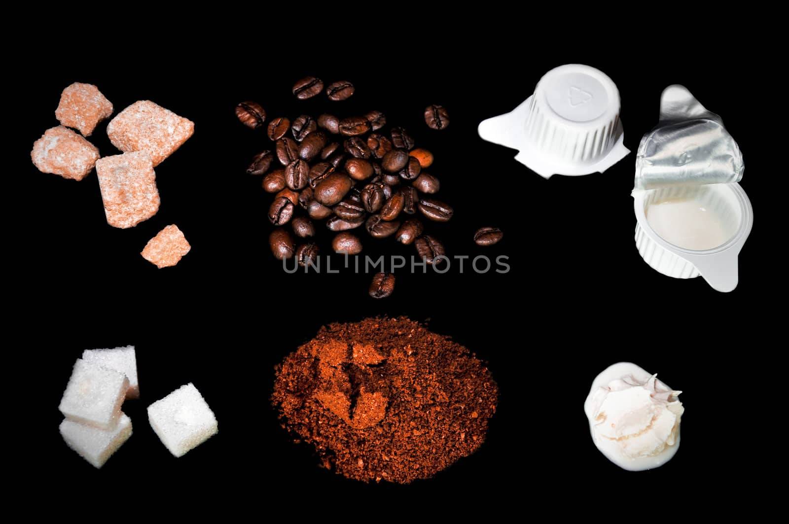 coffee ingredient, beans, cube sugar, cream isolated on a black background