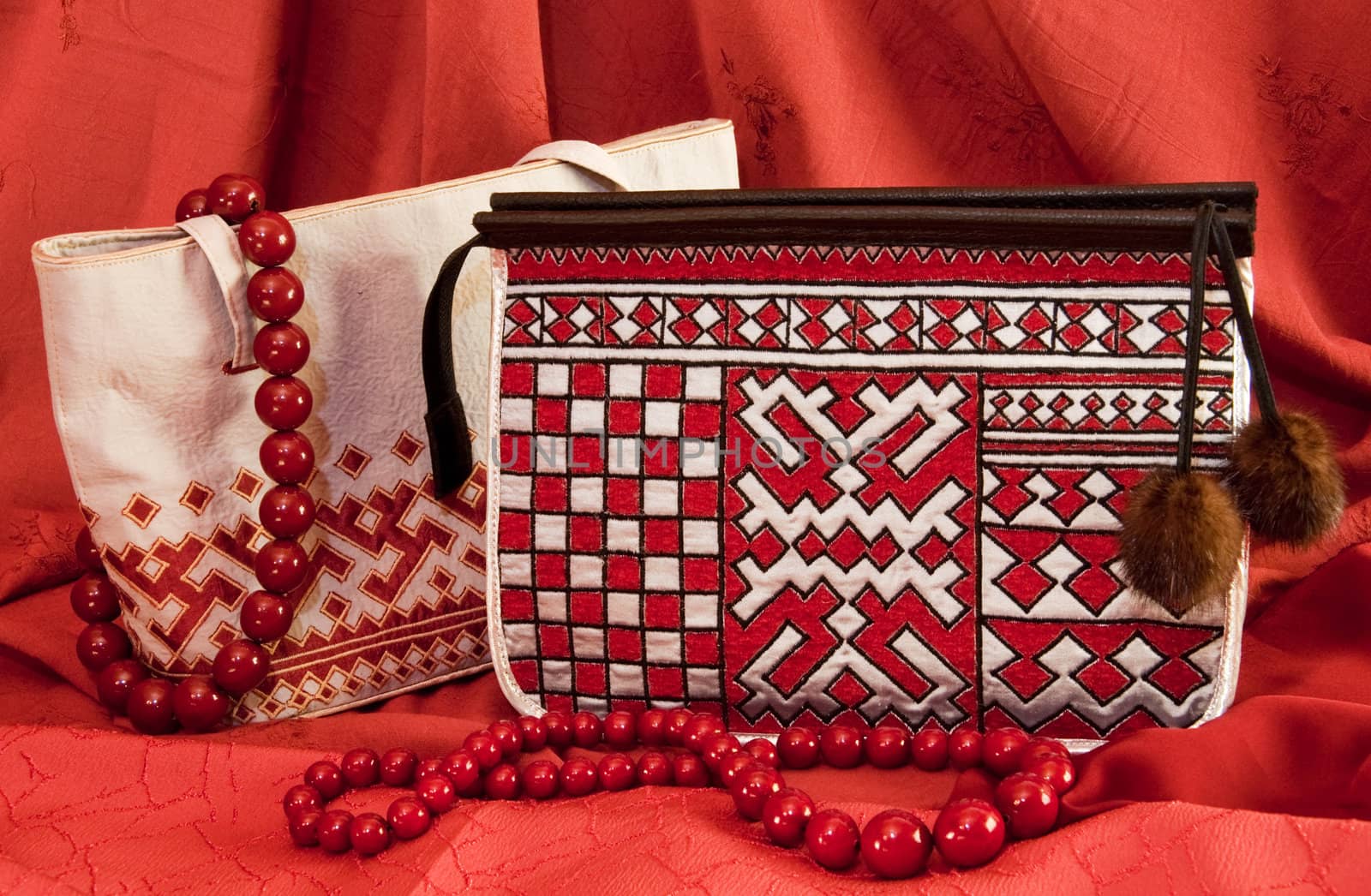 handbags with ornament in northern style on a red background