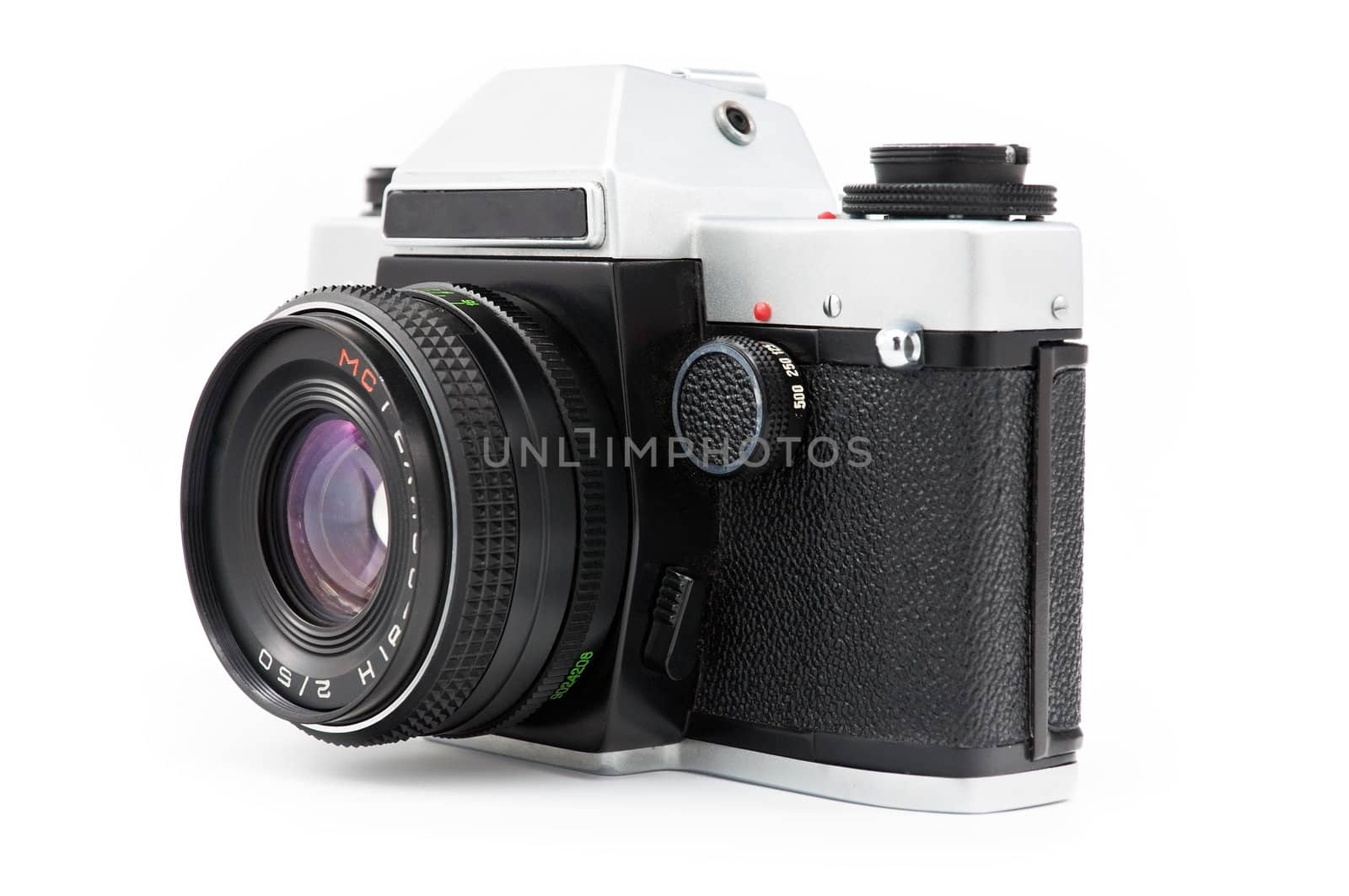 A classic manual film camera isolated on a white background. 