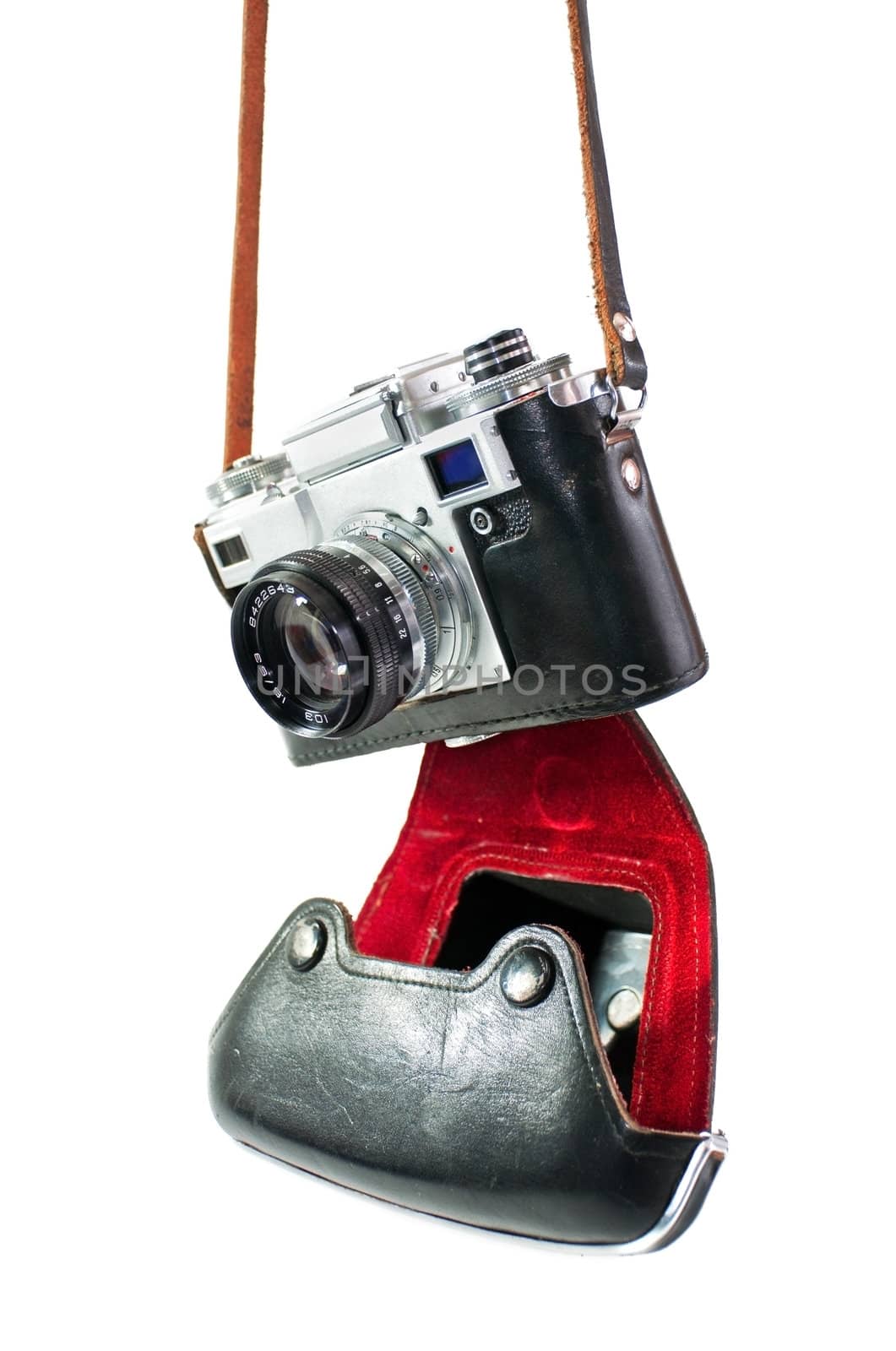 retro camera in red-black case of hanging strap isolated on a white background
