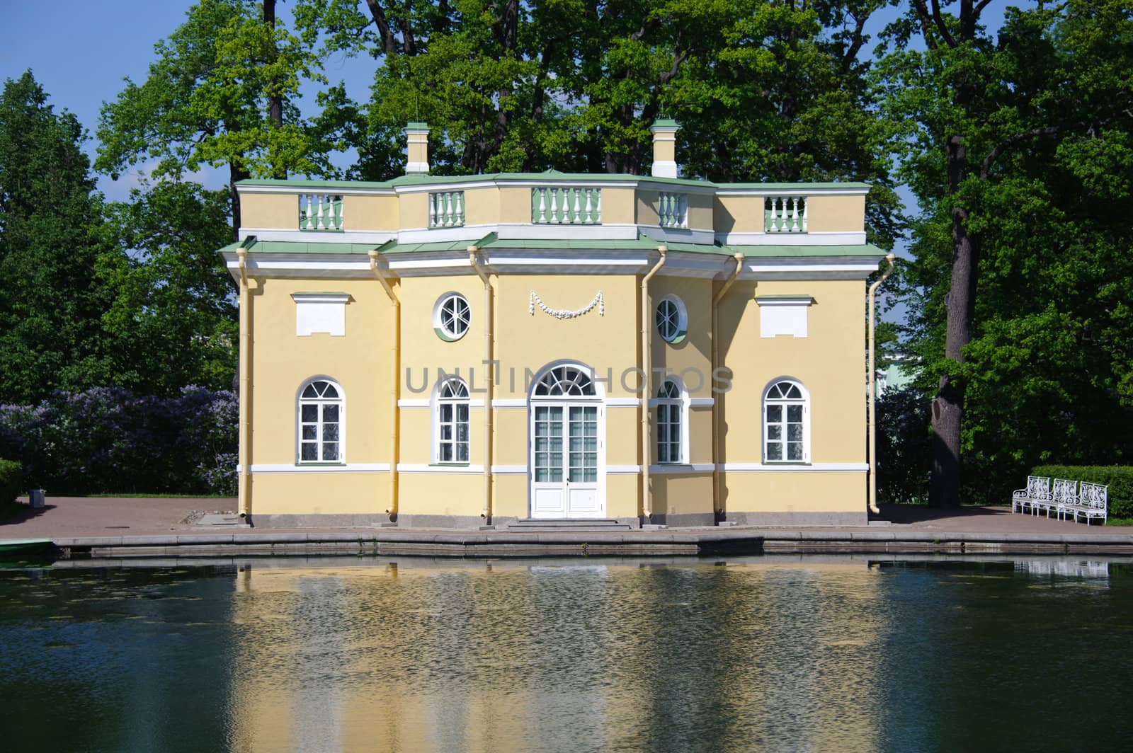 Antique baroque style lodge in the park by a pond. Pushkin ??city, Russia.