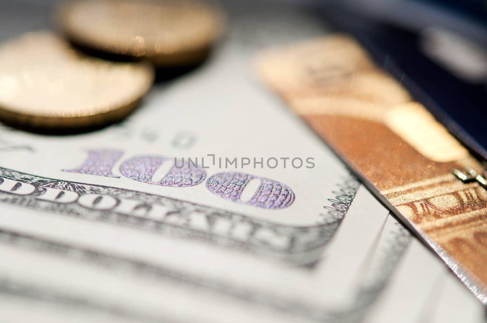 USD banknote, coins and credit card. selective focus. closeup.