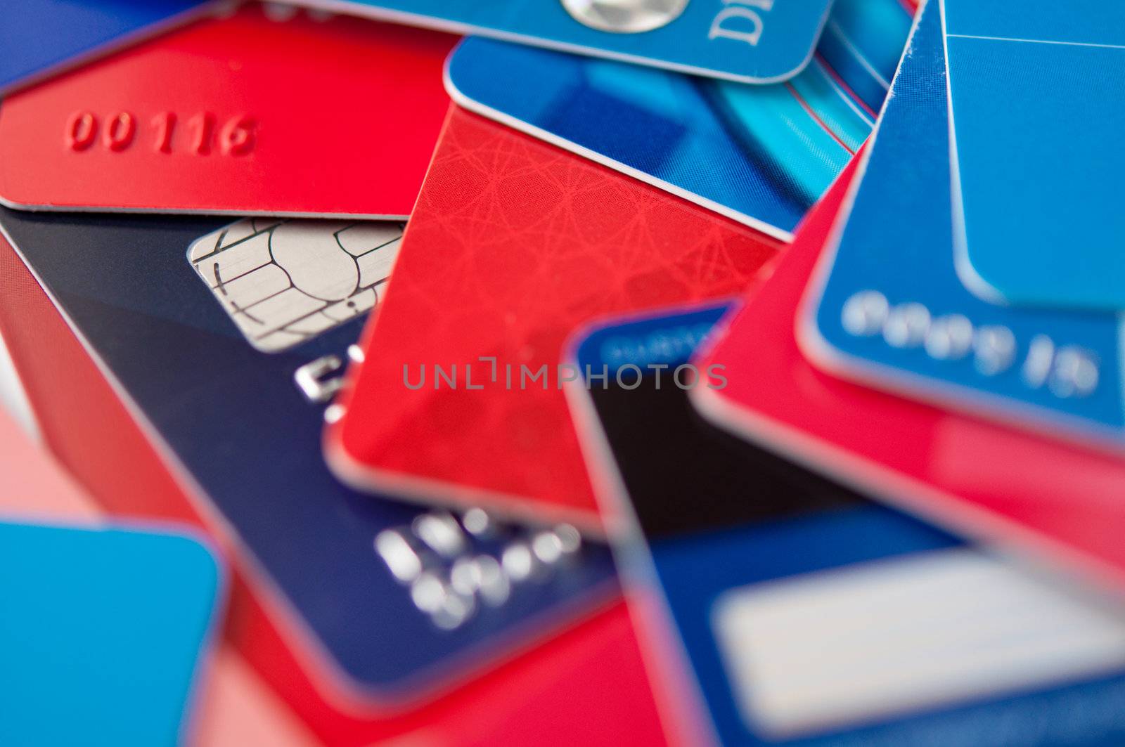 stack plastic credit cards and giftcards, closeup, selective focus