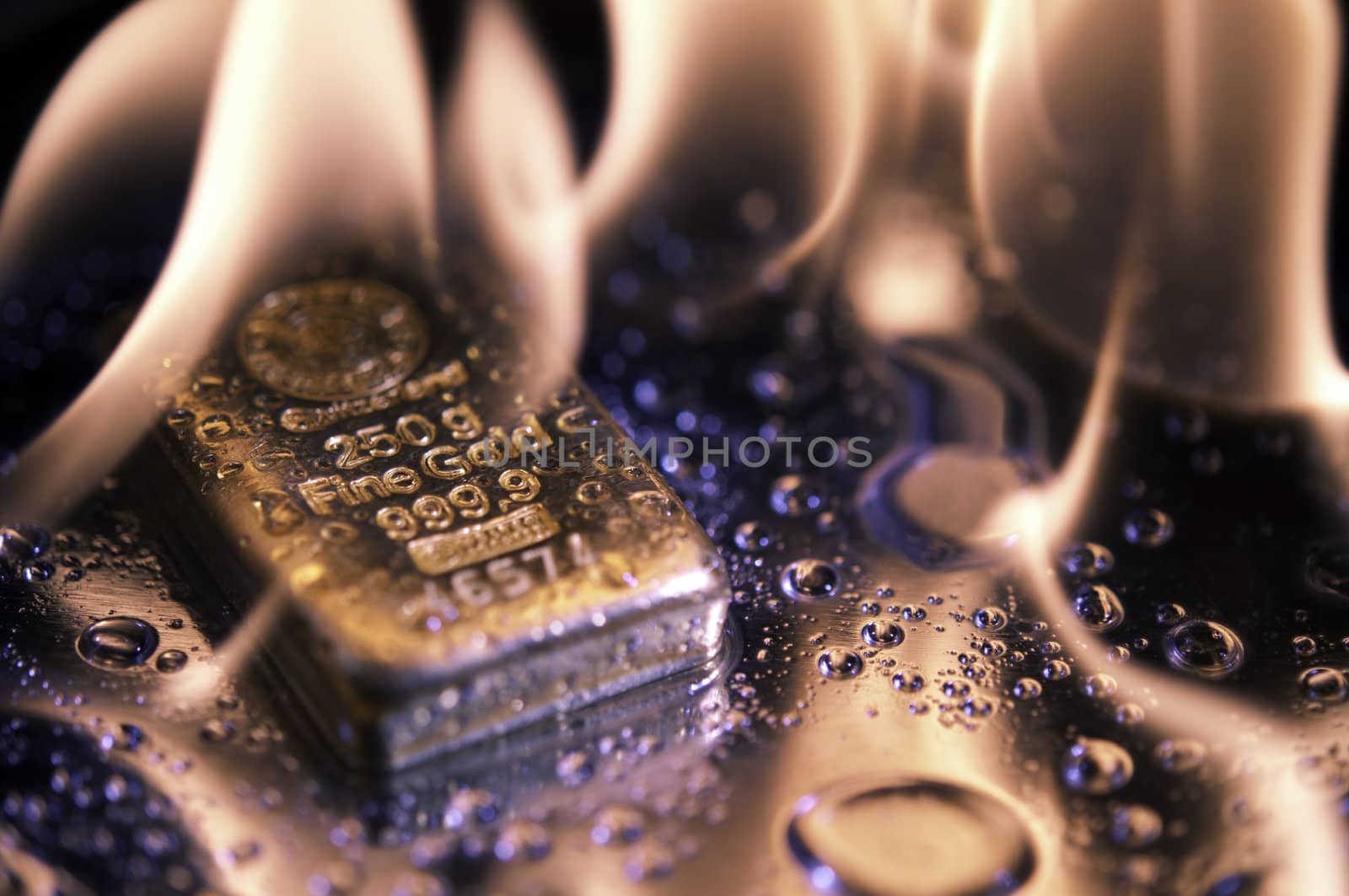gold bullion and  flame. safe investments.