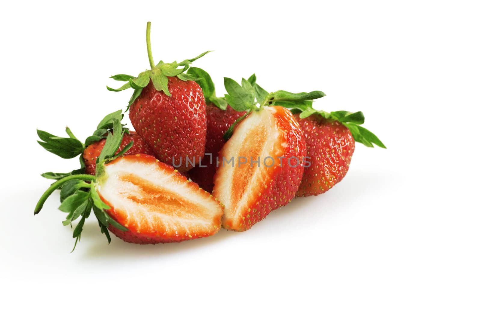 juicy ripe strawberries on white background by Serp
