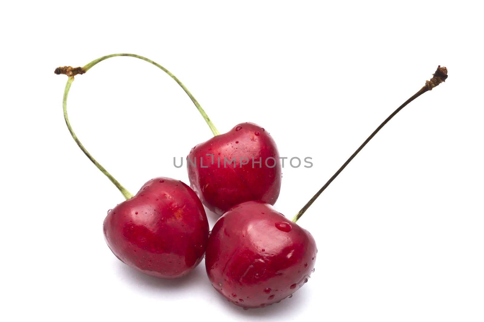 Fresh red cherry isolated on white background