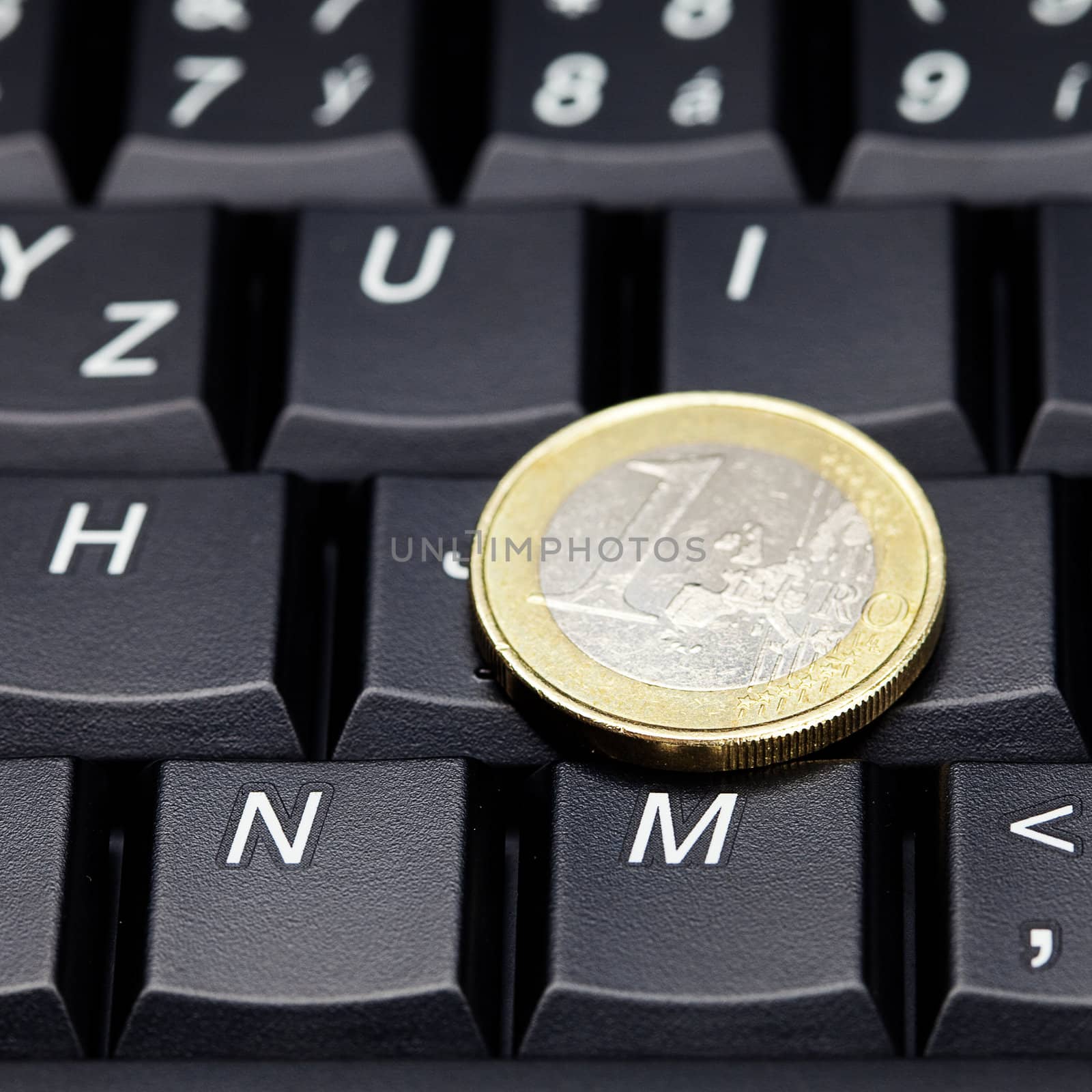 laptop keyboard and coin euro by jannyjus
