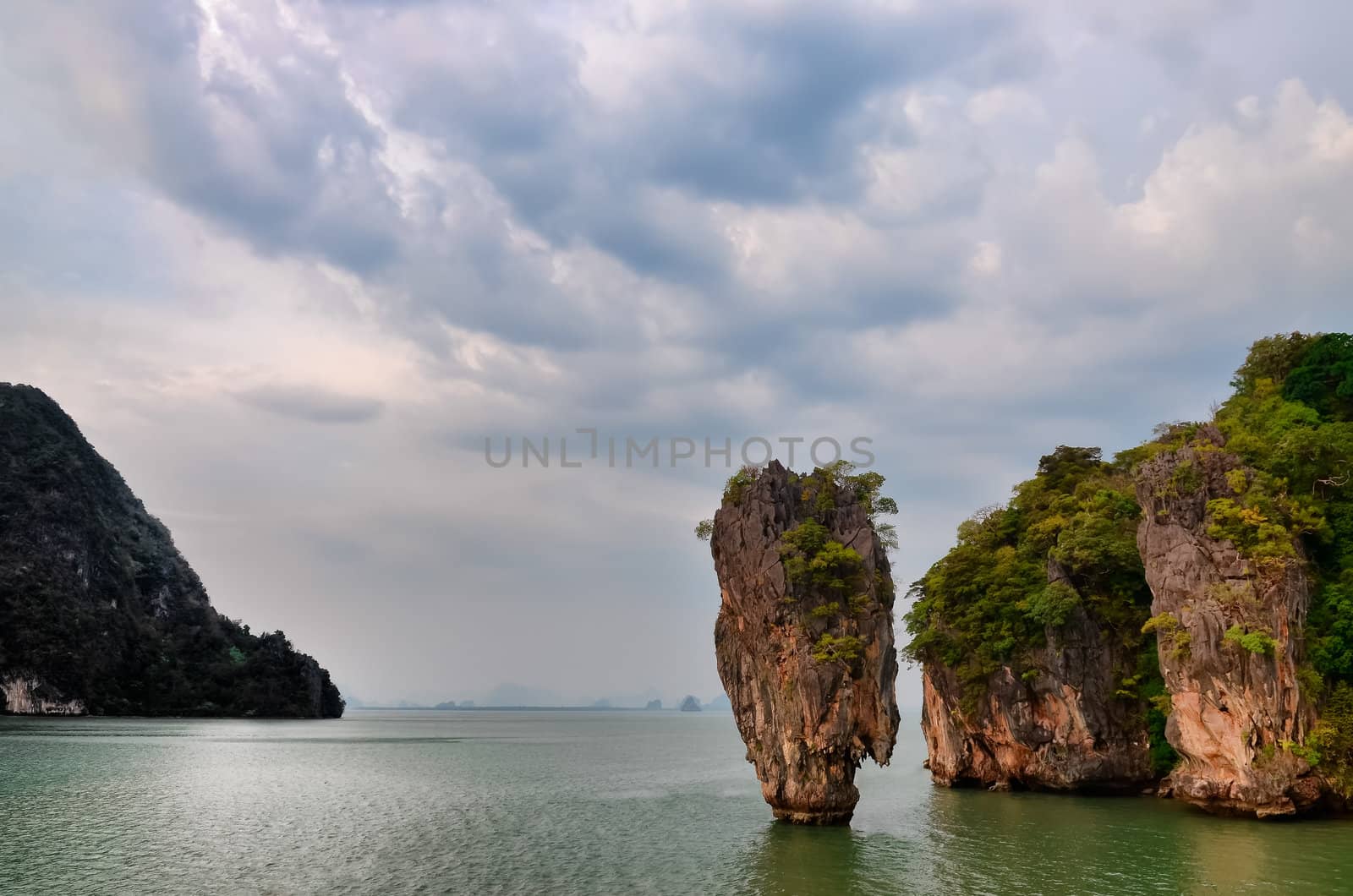 James Bond island ocean view with cloudy sky in Phang Nga bay, A by martinm303