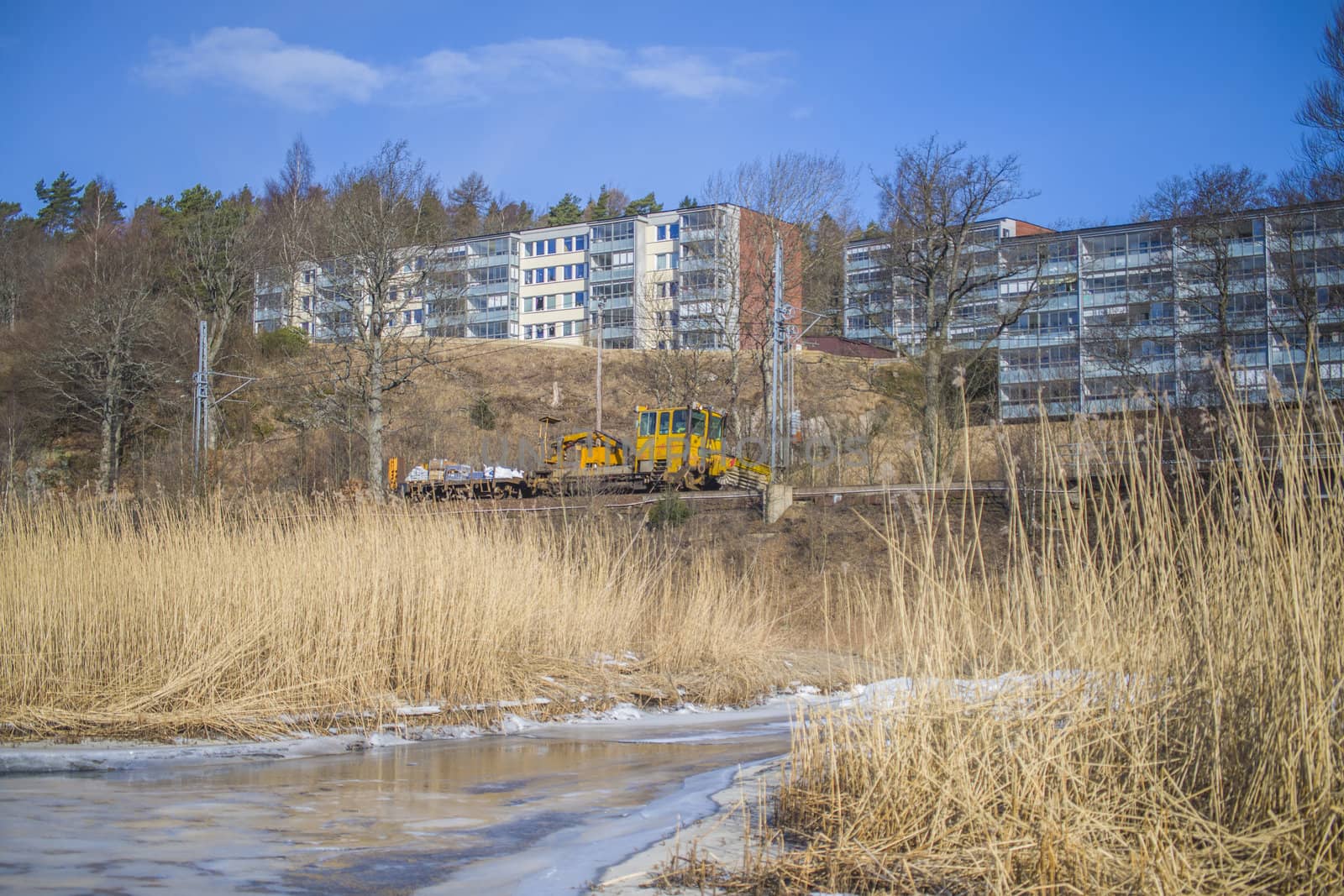 Refne is a small village in Halden, Norway, where the trains runs close by. The picture is shot one day in March 2013.