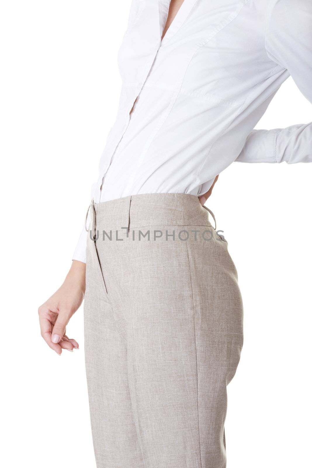 Woman with back pain holding her aching hip