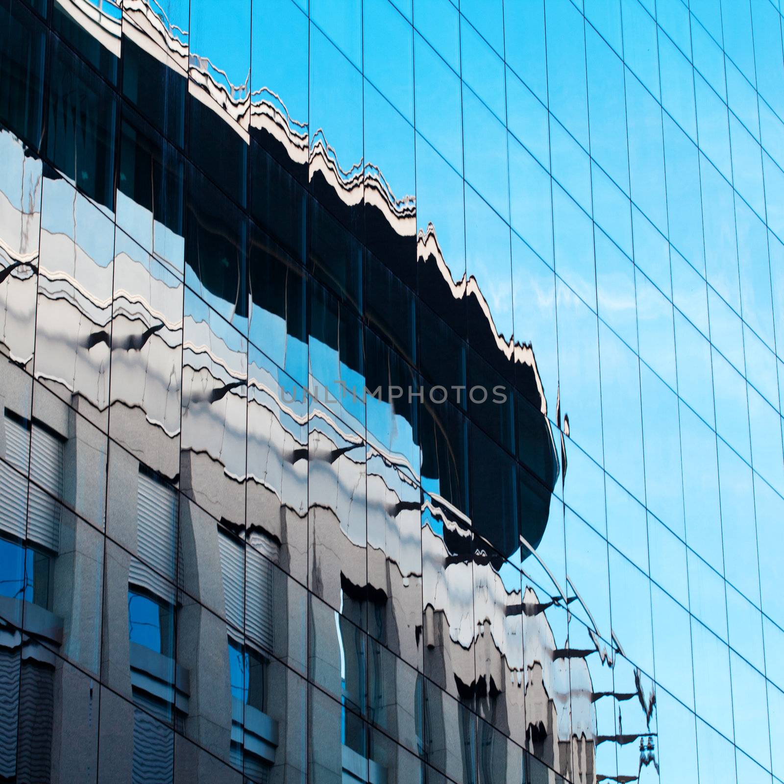 background of the glass modern office building by jannyjus