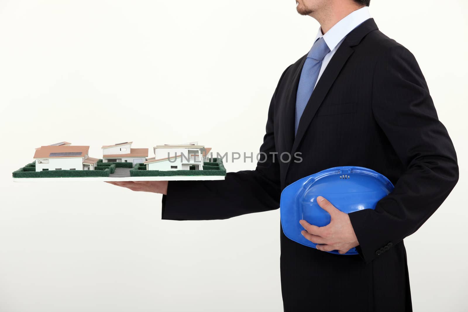 Architect showing his model. by phovoir