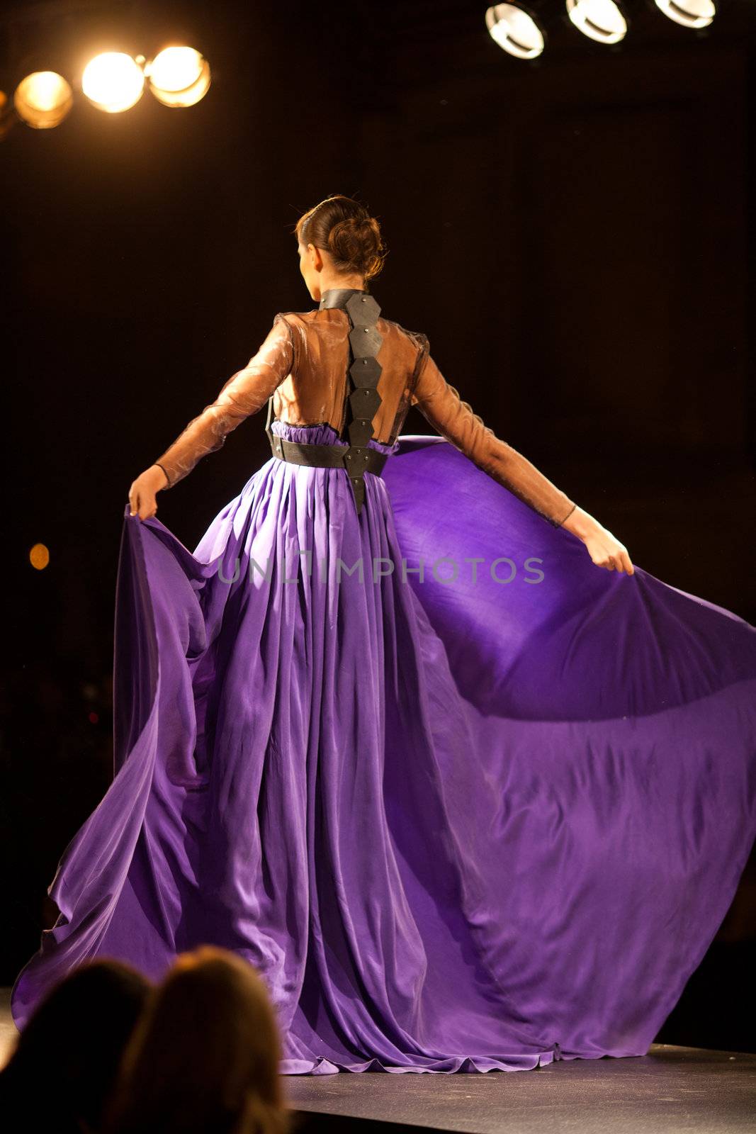 PRAGUE-SEPTEMBER 24: A model walks the runway during the 2011 autumn/winter Nina Ricci Paris Collection by Obsession during the Prague Fashion Weekend on September 24, 2011 in Prague, Czech Republic.