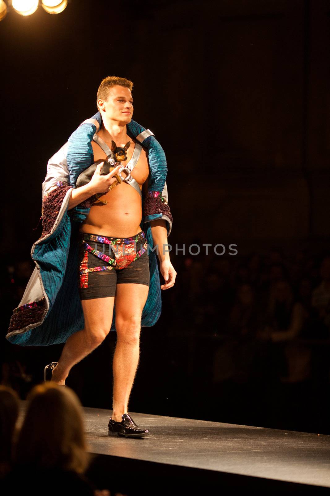 PRAGUE-SEPTEMBER 24: A model walks the runway during the 2011 autumn/winter Nina Ricci Paris Collection by Obsession during the Prague Fashion Weekend on September 24, 2011 in Prague, Czech Republic.