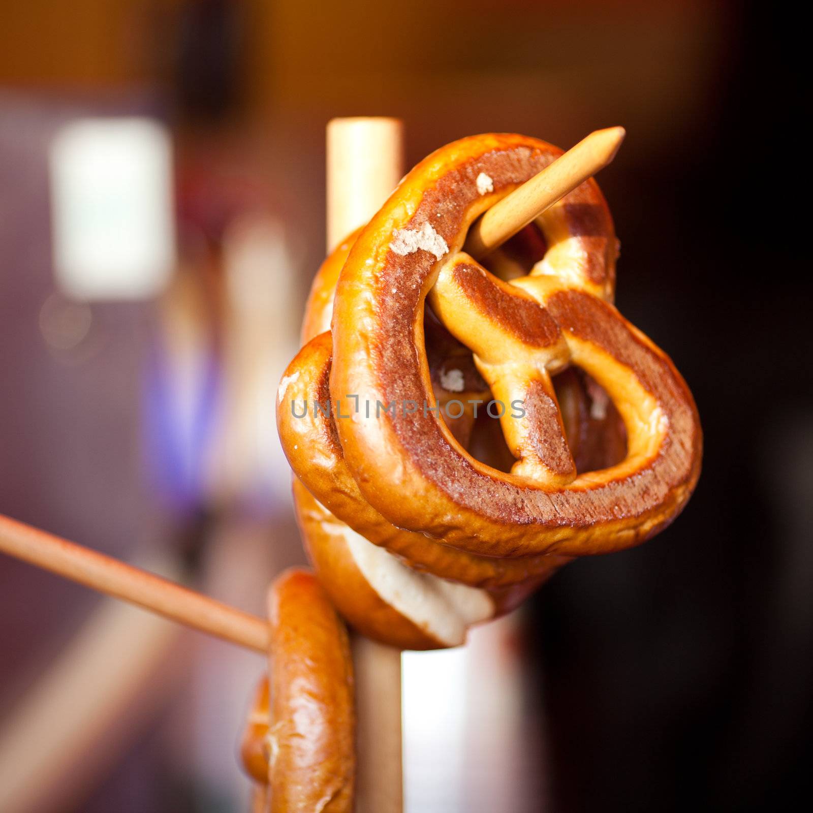 pretzel hanging on a branch by jannyjus