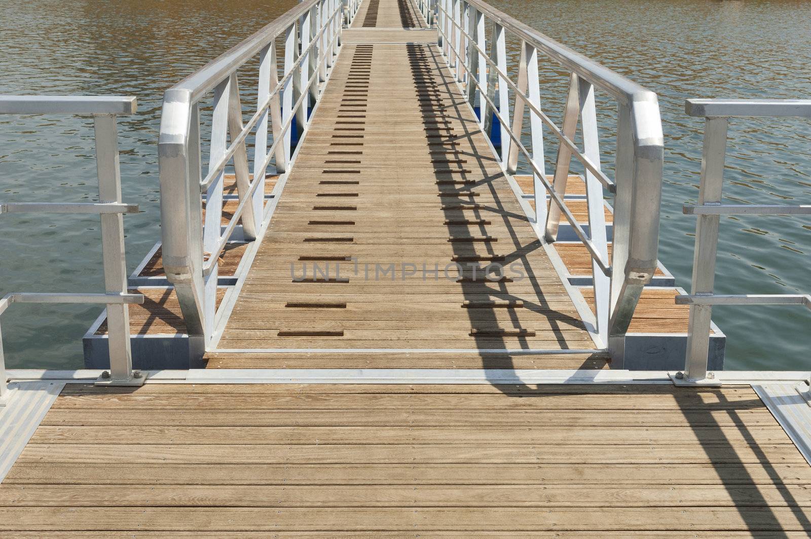 Wooden walkway serving Amieira pier on the banks of the reservoir of Alqueva, Alentejo, Portugal