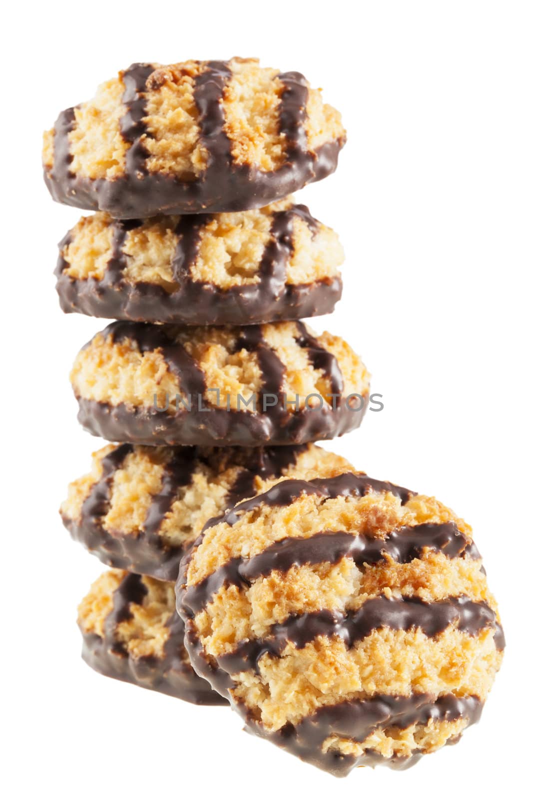 Stack of coconut macaroons with chocolate isolated on a white background