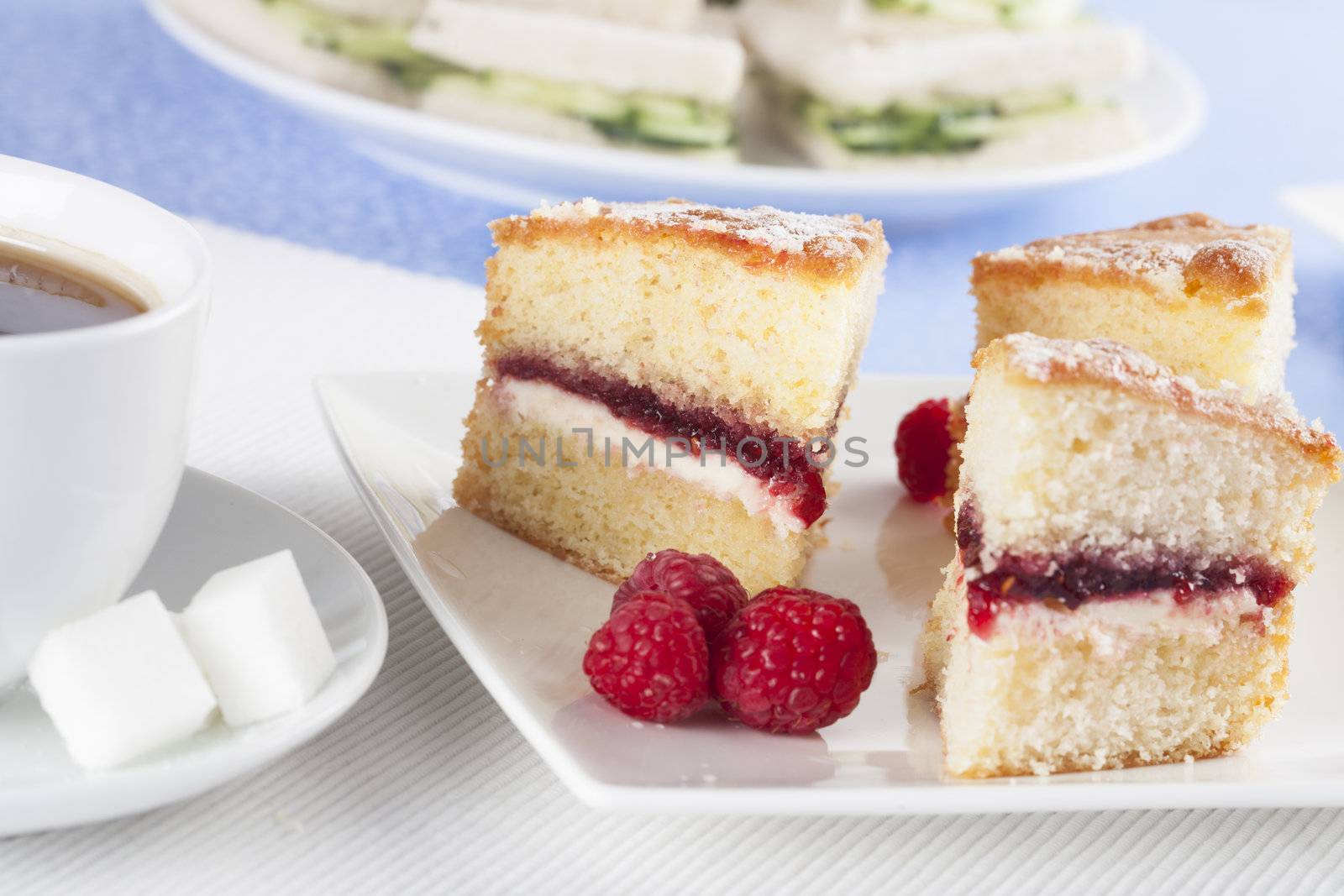 Victoria sponge cake with raspberries for afternoon tea.